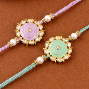 Elegant green rakhi with gold floral medallion, pearl beads, and stone detailing on braided green thread.