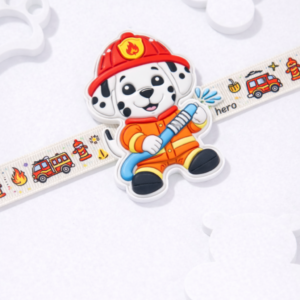 Cute firefighter dog cartoon kids rakhi with rescue-themed strap and colorful design.