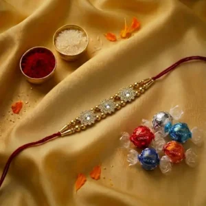 White glod stone Rakhi with Lindor Truffle Combo
