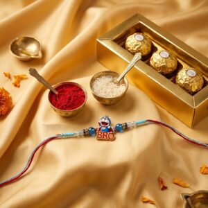 Cute cartoon Rakhi for kids with colorful design and roli chawal for Raksha Bandhan celebration.