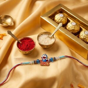 Cute cartoon Rakhi for kids with colorful design and roli chawal for Raksha Bandhan celebration.